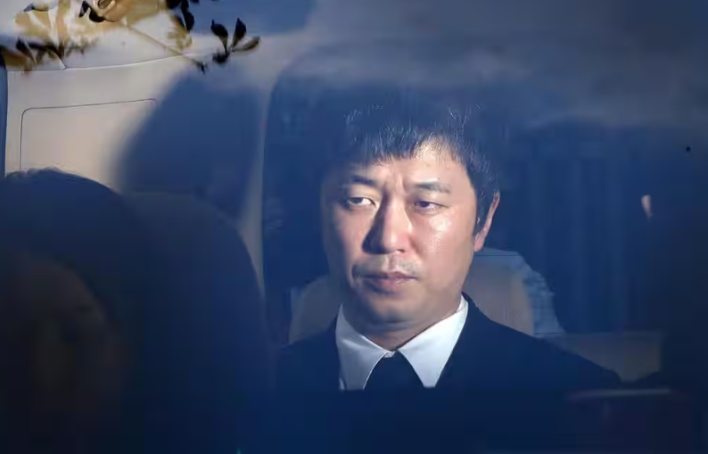 逮捕時の新井浩文さんの写真